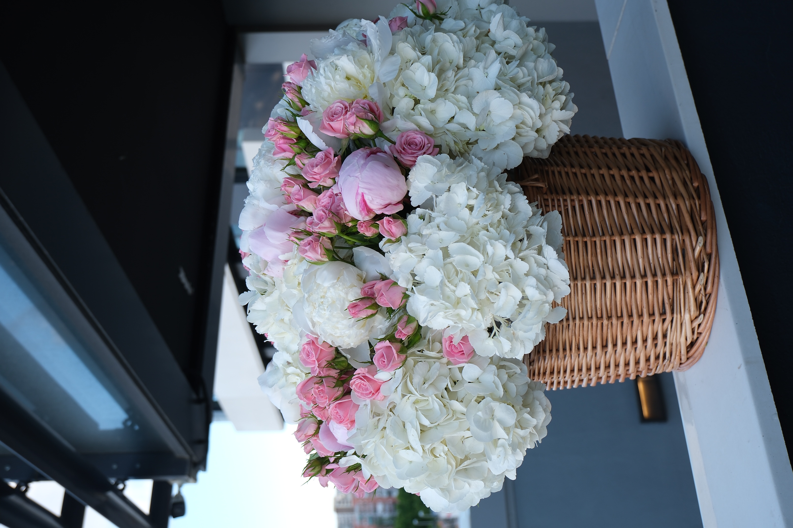 White hydrangea and roses basket