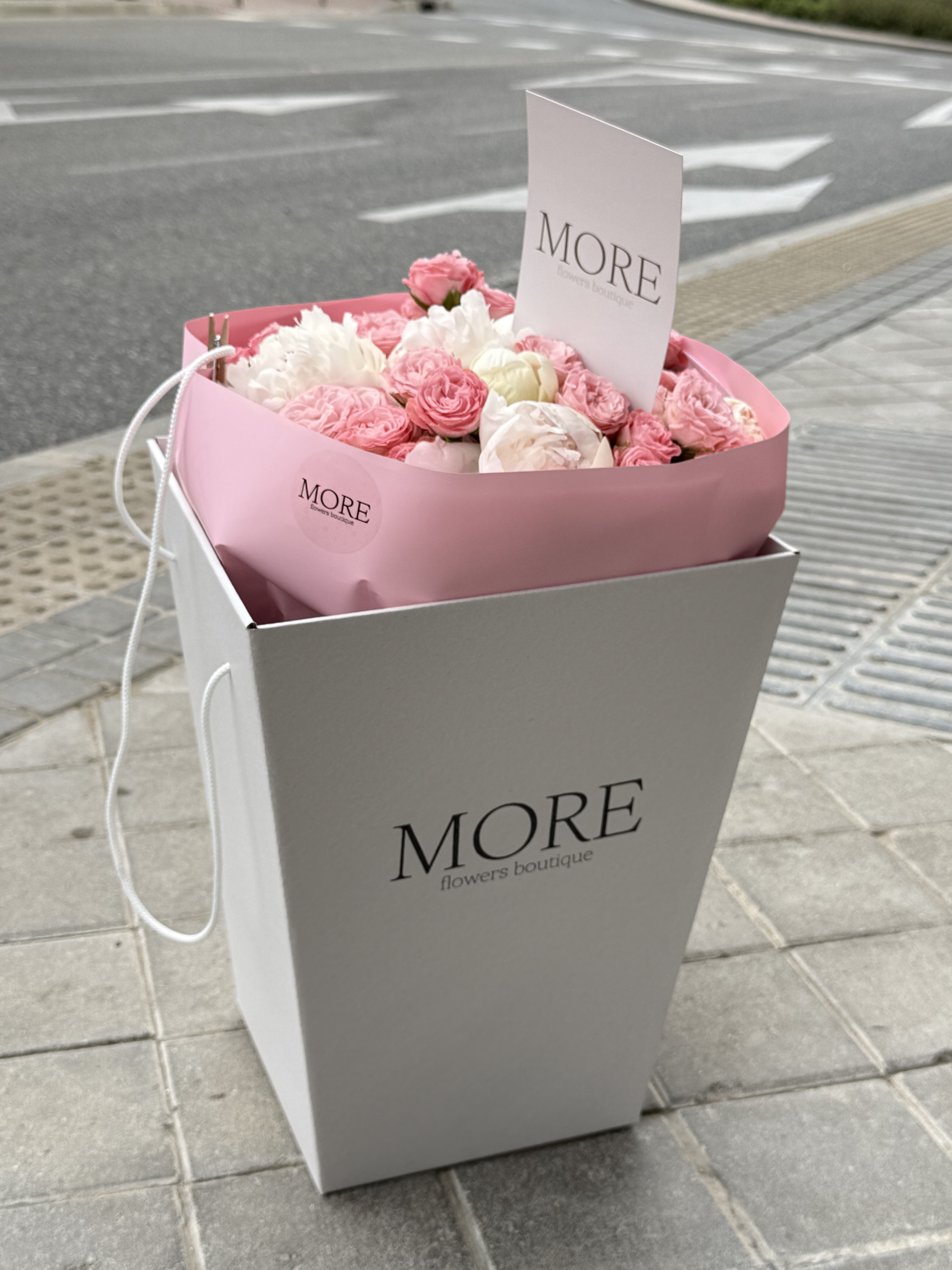 Pink spray roses in signature box